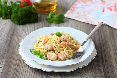 Spaghetti z owocami morza w sosie śmietanowym przepis ze zdjęciami krok po kroku i wideo